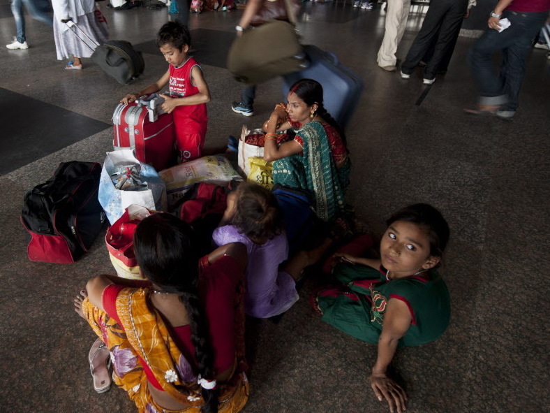 Passengers in New Delhi were waiting for trains that couldn't run because of Monday's power outage.