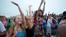 Fans, from left, Jenn Spofford, Chrissy Stewart and Suzanna Kopec, all of Providence, R.I., cheer for My Morning Jacket as the band performs on the Fort Stage at the Newport Folk Festival. Fans, from left, Jenn Spofford, Chrissy Stewart and Suzanna Kopec, all of Providence, R.I., cheer for My Morning Jacket as the band performs on the Fort Stage at the Newport Folk Festival.