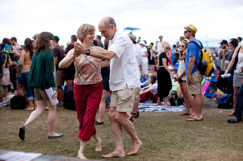 Bill Caldwell and Suzanne McQueen, both of Washington, D.C., danced to the funky soul of Charles Bradley outside the Fort Stage.