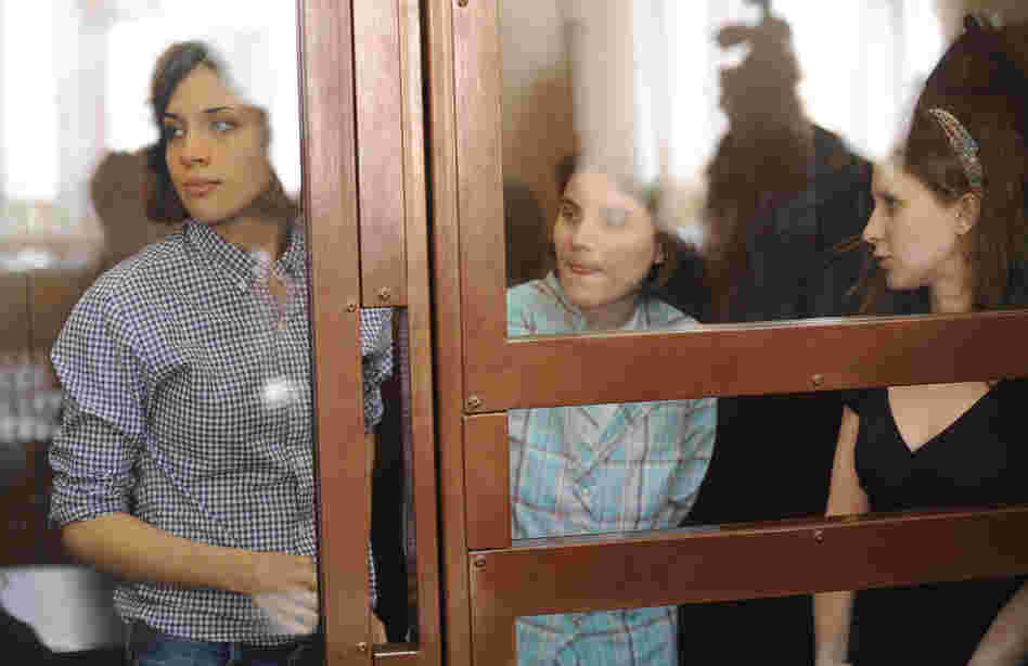 Members of the feminist punk band Pussy Riot, Nadezha Tolokonnikova (left), Yekaterina Samutsevich (center) and Maria Alyokhina, at a hearing in Moscow court on Monday.