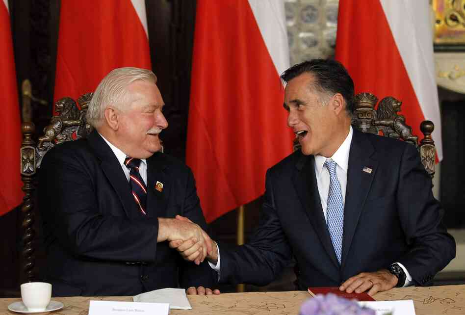 Mitt Romney, right, meets Monday with former Polish President Lech Walesa in Gdansk.