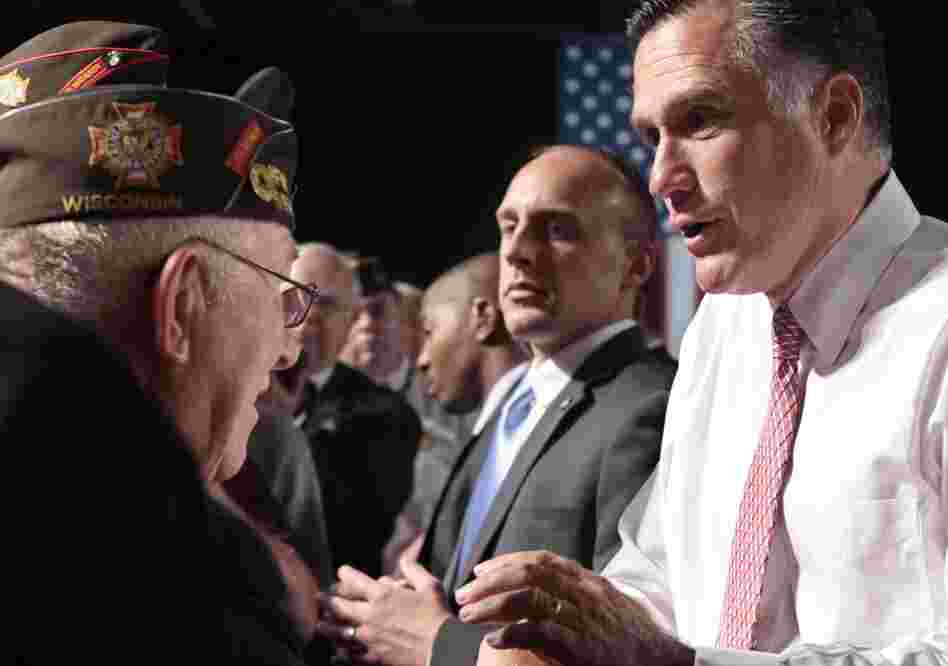 Republican presidential candidate Mitt Romney meets with members of the Veterans of Foreign Wars after his speech at the VFW National Convention in Reno, Nev., on July 24.
