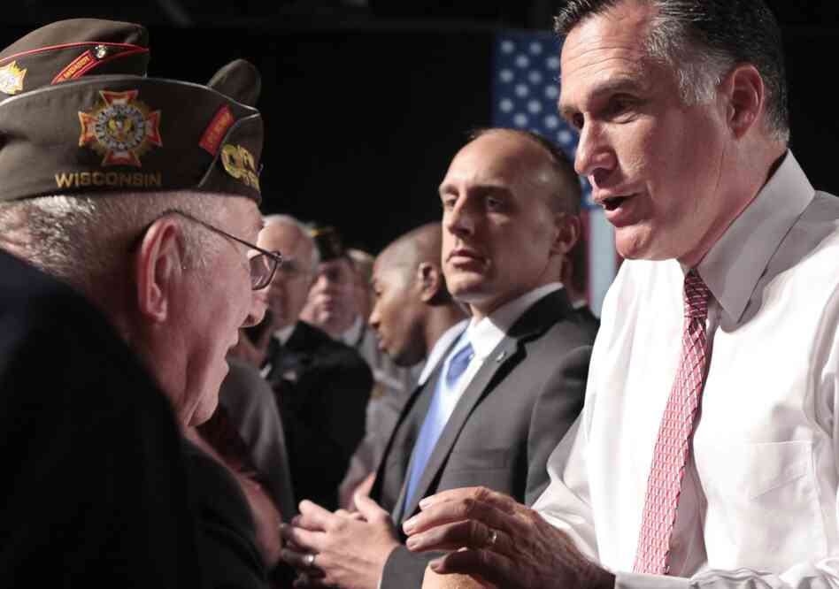 Republican presidential candidate Mitt Romney meets with members of the Veterans of Foreign Wars after his speech at the VFW National Convention in Reno, Nev., on July 24.