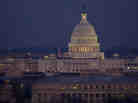 WASHINGTON, DC - FEBRUARY 7: In this handout photo provided by NASA, a full Moon lights the sky above the U.S. Capitol early in the evening on February 7, 2012 from Arlington National Cemetery in Washington, DC. Tonight's moon marks the peak of its waxing.