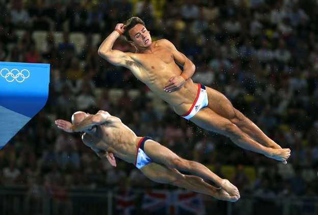 Tom Daley (R) and Peter Waterfield of Great Britain compete in the Men's Synchronised 10m Platform Diving Tuesday in London, England.