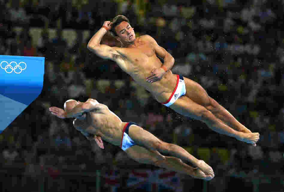 Tom Daley (R) and Peter Waterfield of Great Britain compete in the Men's Synchronised 10m Platform Diving Tuesday in London, England.