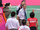 BWF Referee Torsten Berg, center, urges Indonesia's Greysia Polii, center, and Meilana Jauhari, bottom right, and South Korea's Ha Jung Eun, back right, to play fairly in their women's doubles badminton match during the London 2012 Olympic Games in London on Tuesday. BWF Referee Torsten Berg, center, urges Indonesia's Greysia Polii, center, and Meilana Jauhari, bottom right, and South Korea's Ha Jung Eun, back right, to play fairly in their women's doubles badminton match during the London 2012 Olympic Games in London on Tuesday.