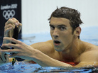 Michael Phelps reacts after winning silver in the men's 200-meter butterfly final at the Aquatics Centre on Tuesday. South Africa's Chad le Clos took home the gold. Michael Phelps reacts after winning silver in the men's 200-meter butterfly final at the Aquatics Centre on Tuesday. South Africa's Chad le Clos took home the gold.