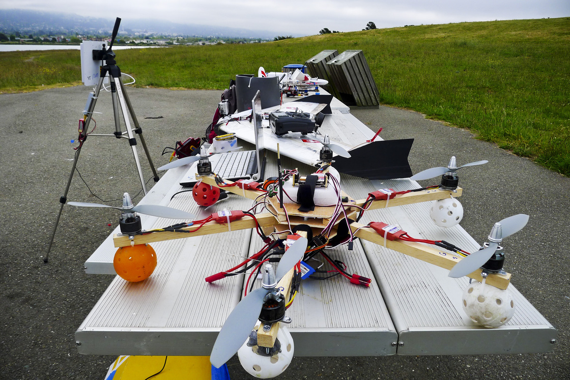 Hi-tech hobbyists Andreas Oesterer and Mark Harrison line up their homemade drones in Berkeley, Calif.