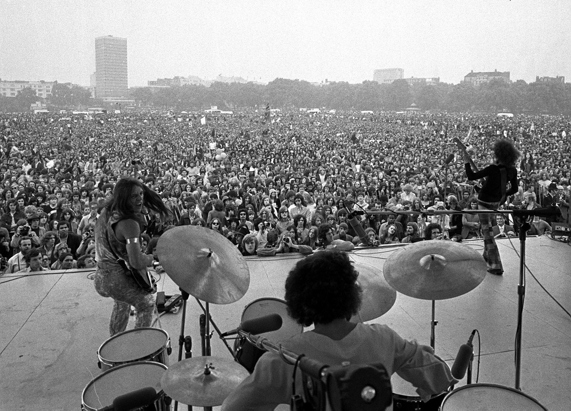 The members of Grand Funk Railroad, Don Brewer (drums), guitarists Mel Schacher (right) and Mark Farner play at a free concert in London's Hyde Park in 1971.