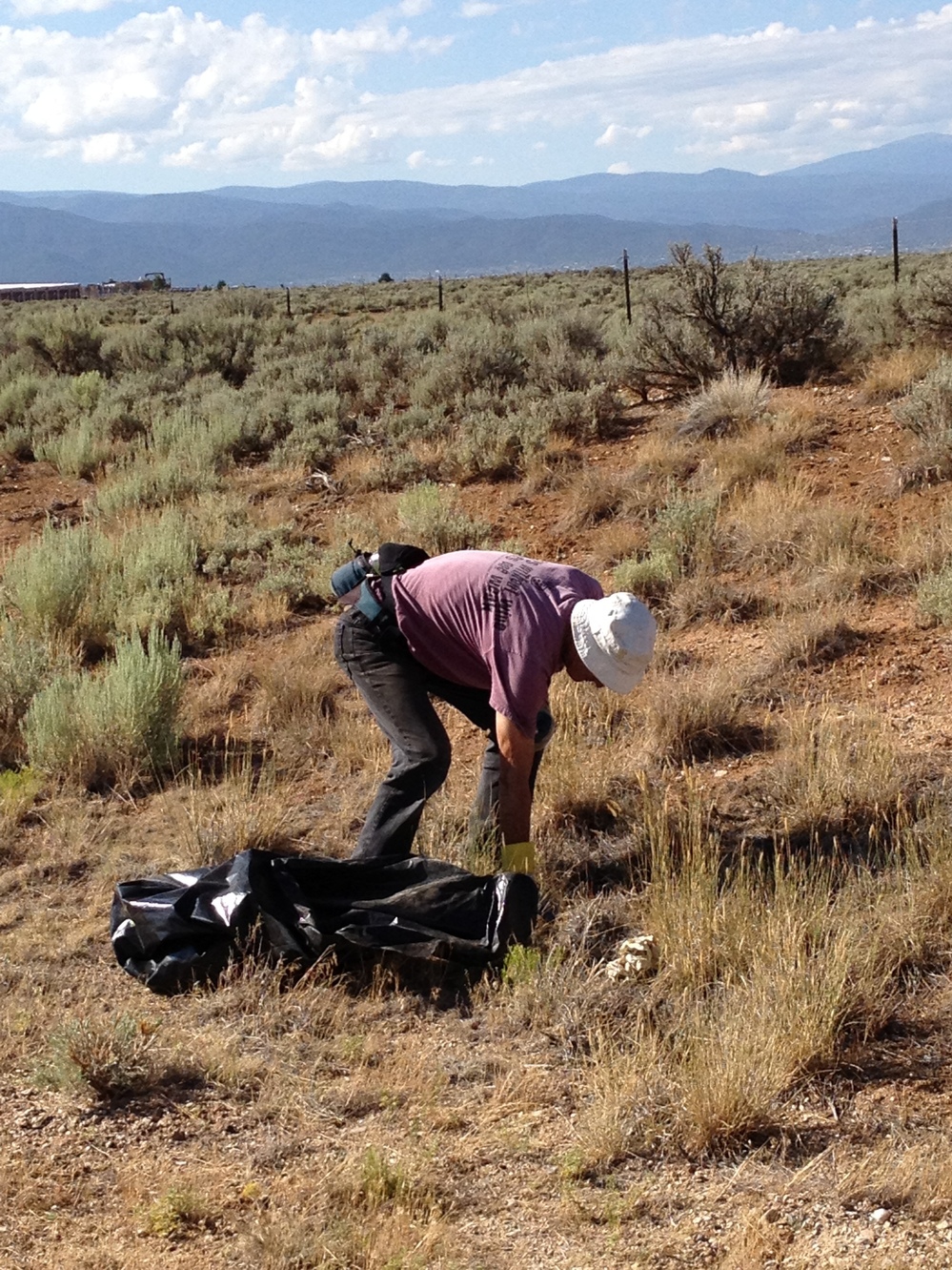 Bruce Boyd helps clean up his community by gathering the litter that collects on the highway.