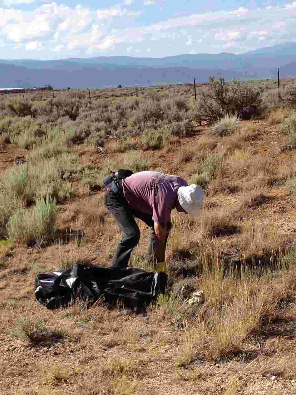 Bruce Boyd helps clean up his community by gathering the litter that collects on the highway.