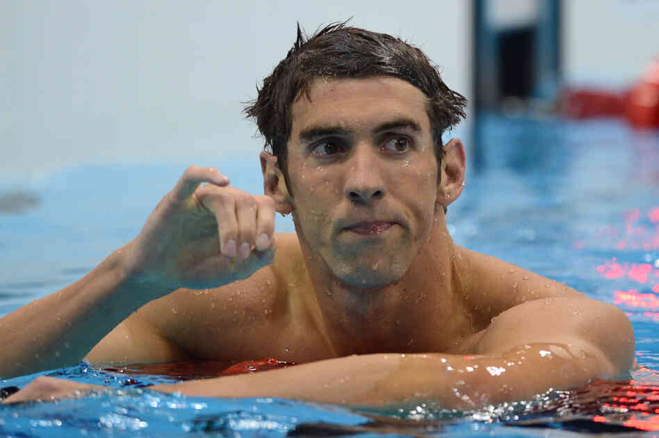 Swimmer Michael Phelps reacts after finishing second in the men's 200m butterfly final at the London 2012 Olympic Games.