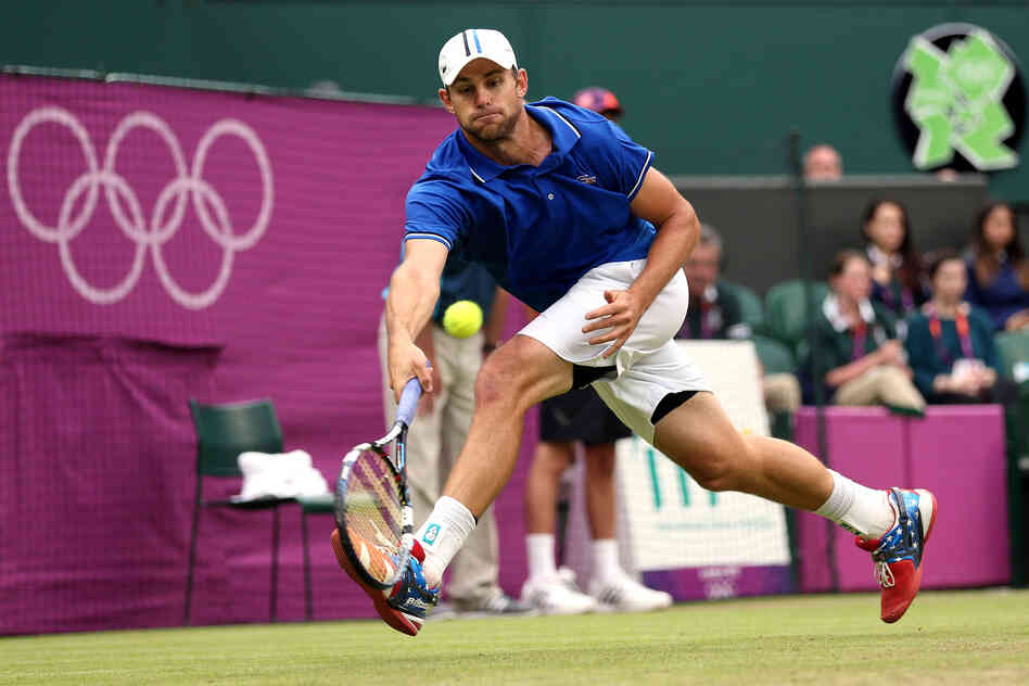 Andy Roddick of the United States returns a shot to Novak Djokovic of Serbia during the second round of Men's Singles Tennis. Roddick lost the match.
