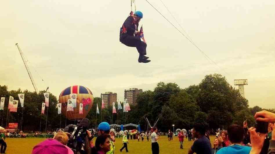Boris Johnson awaits rescue from his zipline above Victoria Park.