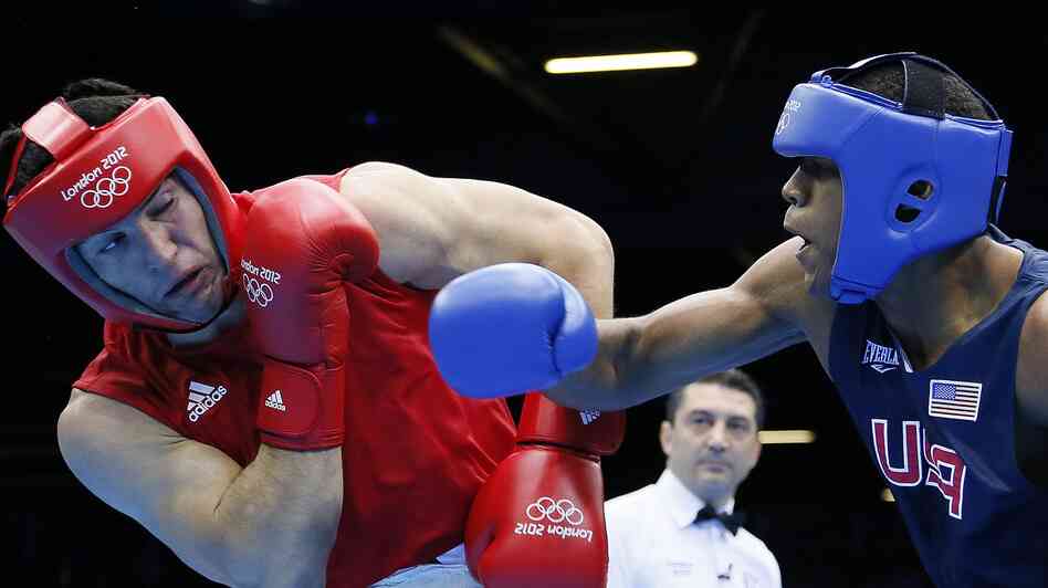 hide caption Boxer Michael Hunter Jr. of the U.S. lost a close bout to