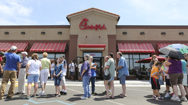 The line stretched into the parking lot today at a Chick-fil-A restaurant in Wichita, Kan.