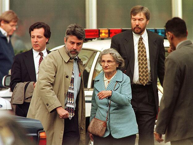 Wanda Kaczynski and her son David Kaczynski (right background) are escorted to their car by defense lawyers after Unabomber Theodore Kaczynski pleaded guilty Jan. 22, 1998, in Sacramento, Calif.