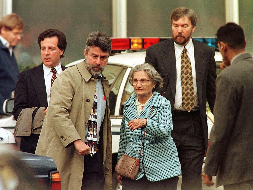 Wanda Kaczynski and her son David Kaczynski (right background) are escorted to their car by defense lawyers after Unabomber Theodore Kaczynski pleaded guilty Jan. 22, 1998, in Sacramento, Calif.