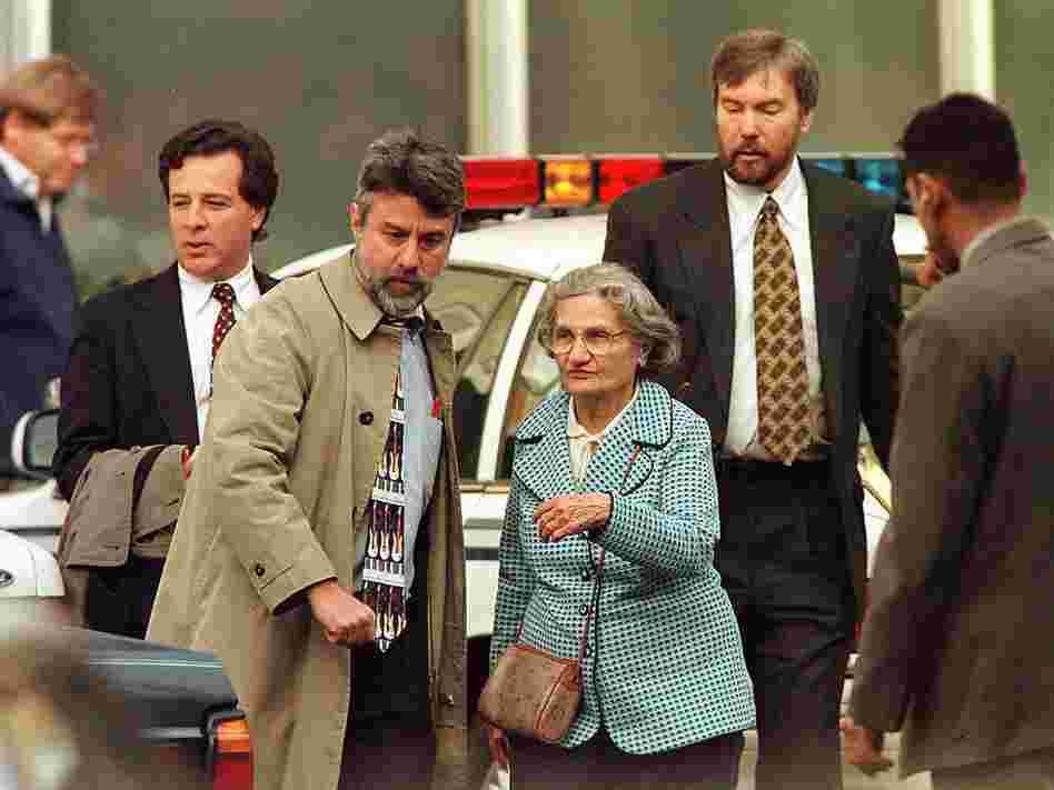 Wanda Kaczynski and her son David Kaczynski (right background) are escorted to their car by defense lawyers after Unabomber Theodore Kaczynski pleaded guilty Jan. 22, 1998, in Sacramento, Calif.