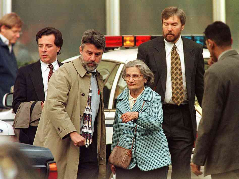 Wanda Kaczynski and her son David Kaczynski (right background) are escorted to their car by defense lawyers after Unabomber Theodore Kaczynski pleaded guilty Jan. 22, 1998, in Sacramento, Calif.