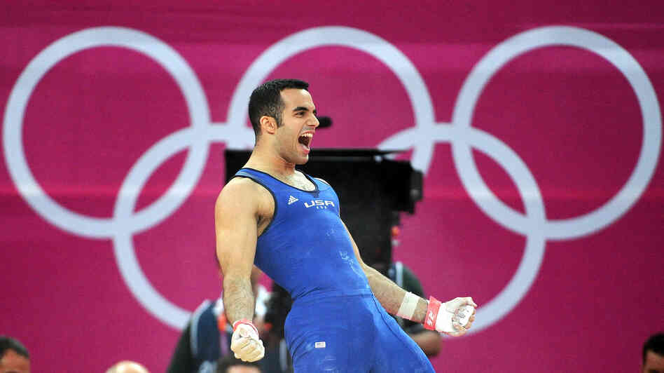 Gymnast Danell Leyva of the United States celebrates after his final rotation in the men's individual all-around final.