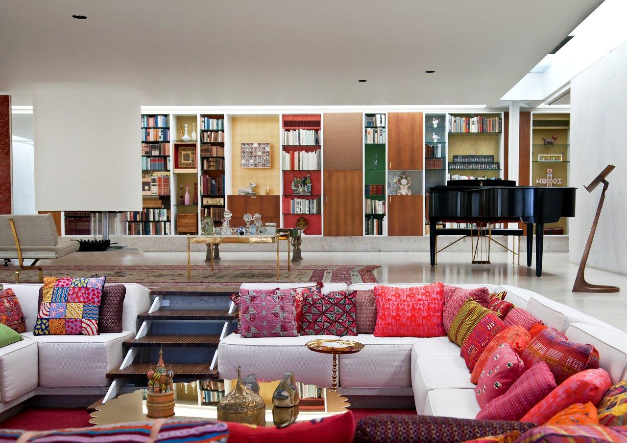 Inside, the sunken "conversation pit" allows for plenty of seating without visual clutter. Architect and designer Alexander Girard worked with Will Miller's mother, Xenia Miller, on the house's interior decoration, which includes a selection of textiles that changes seasonally and a 50-foot-long storage wall.