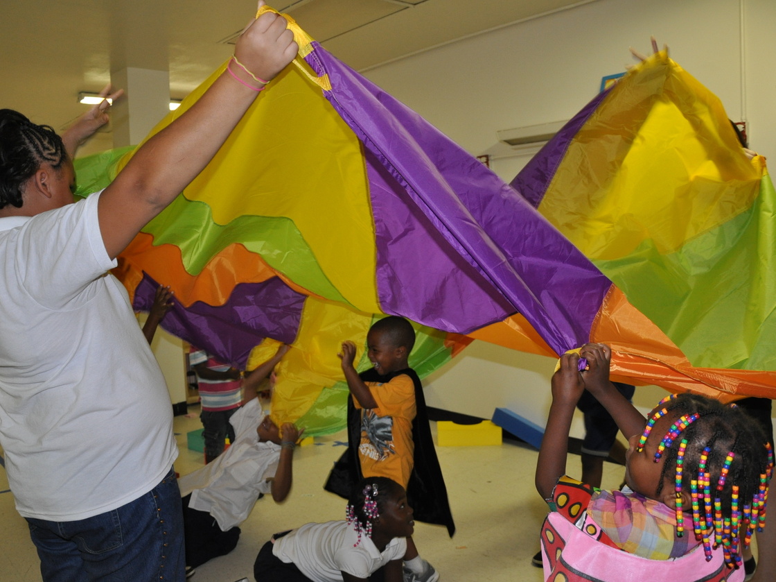 Homeless children have the opportunity to play with volunteers.