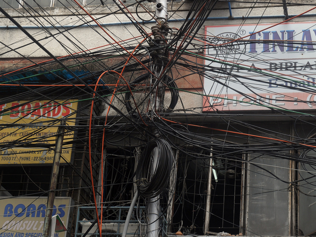 Plenty of wires. But where's the juice? This electric pole in Kolkata is typical of many in heavily populated India.