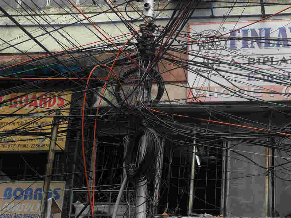 Plenty of wires. But where's the juice? This electric pole in Kolkata is typical of many in heavily populated India.
