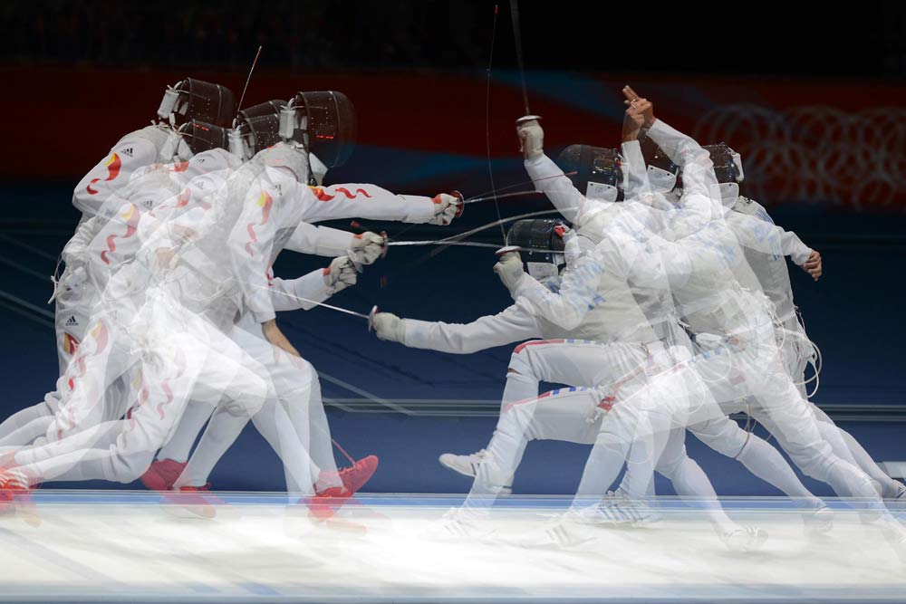 China's Lei Sheng (left) competing against Italy's Andrea Baldini during the men's fencing semi-final