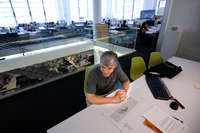 Guy Maxwell, principal at Ennead Architects, talks to a reporter in the firm's Manhattan offices.