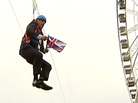 A still image taken from an eyewitness video shows London's Mayor Boris Johnson hanging from a zipline, after losing his momentum. A still image taken from an eyewitness video shows London's Mayor Boris Johnson hanging from a zipline, after losing his momentum.