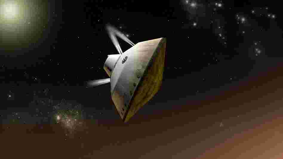 This artist's concept shows thrusters firing to steer the spacecraft as it enters Martian atmosphere. The Curiosity rover has traveled for more than seven months inside the spacecraft.