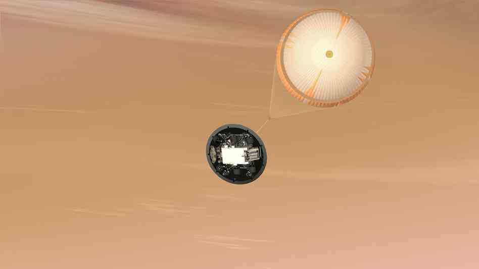 A parachute more than 50 feet across pops out, adding a bit more braking as the craft sinks into Mars's lower atmosphere.