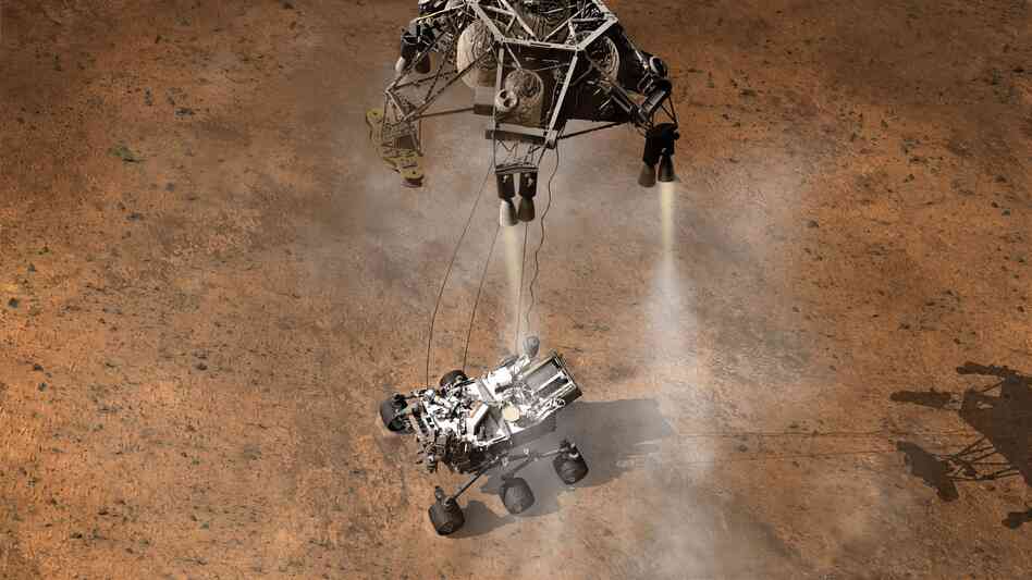 Once the sky crane senses that it's no longer supporting the rover, it releases the cables and flies off to crash-land a safe distance away. Curiosity is now free to explore its new home.