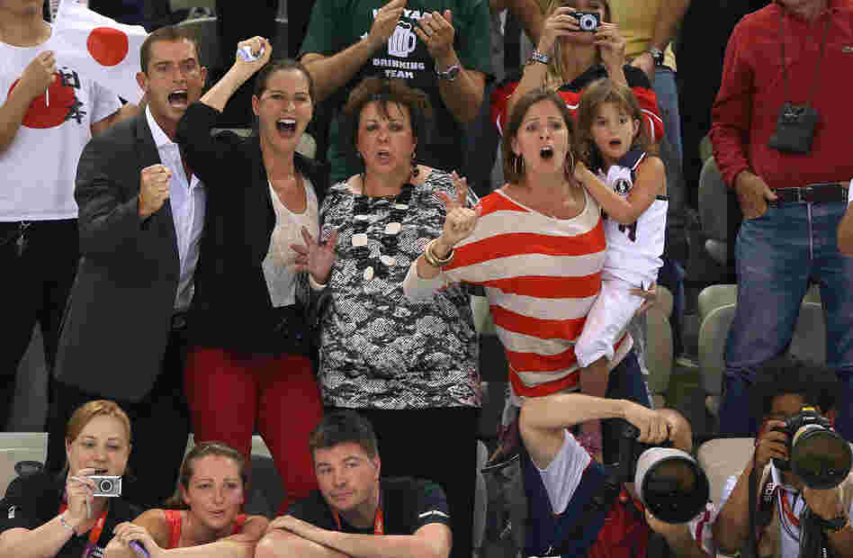 The Phelps family cheers for Michael during the Men's 200m Individual Medley final.
