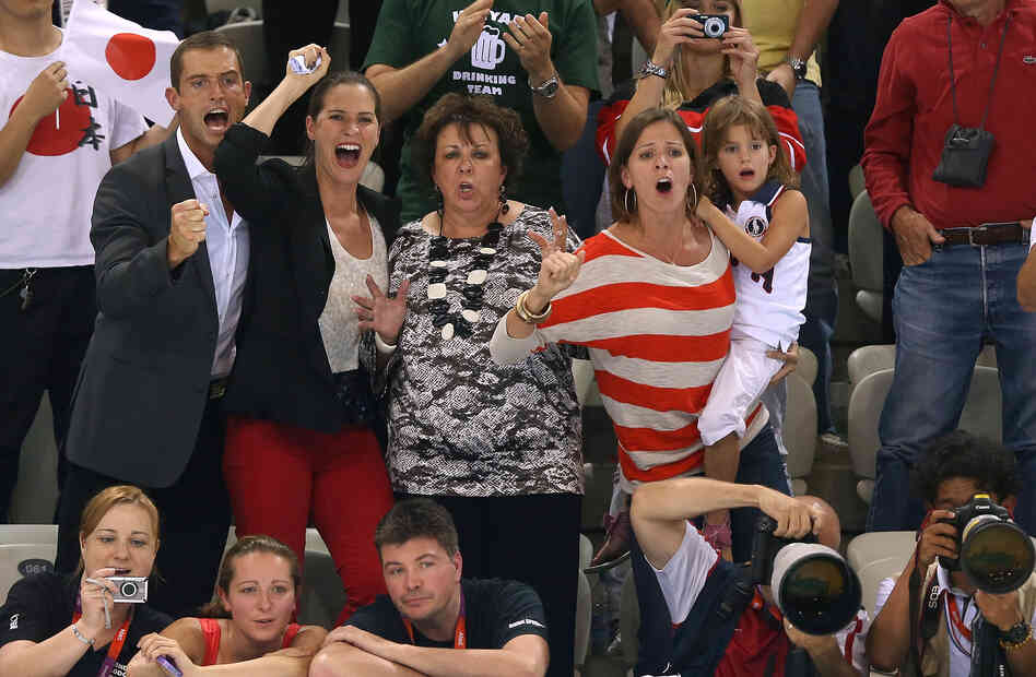 The Phelps family cheers for Michael during the Men's 200m Individual Medley final.