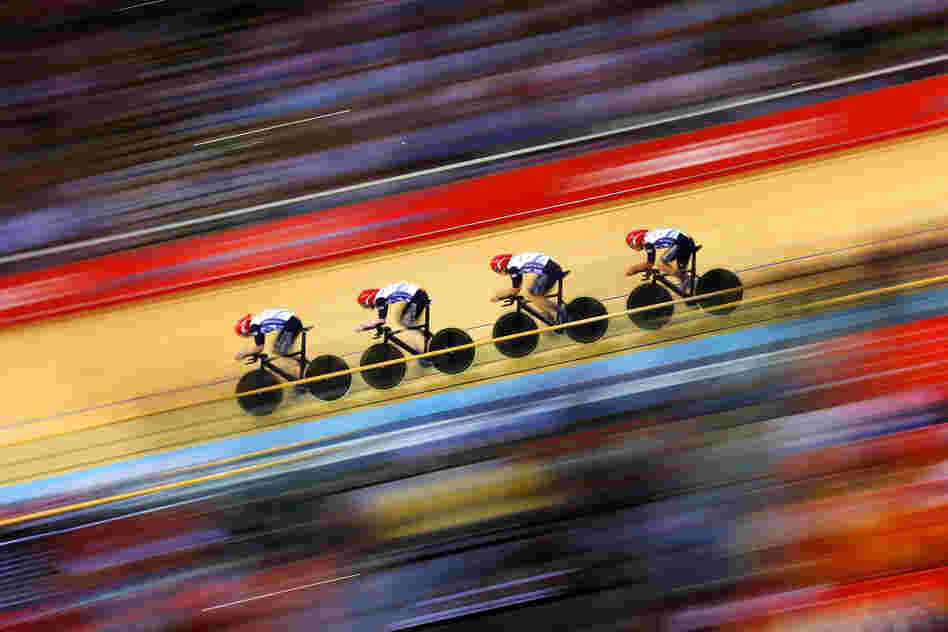 Great Britain posts a new world record time during Men's Team Pursuit Track Cycling Qualifying event.