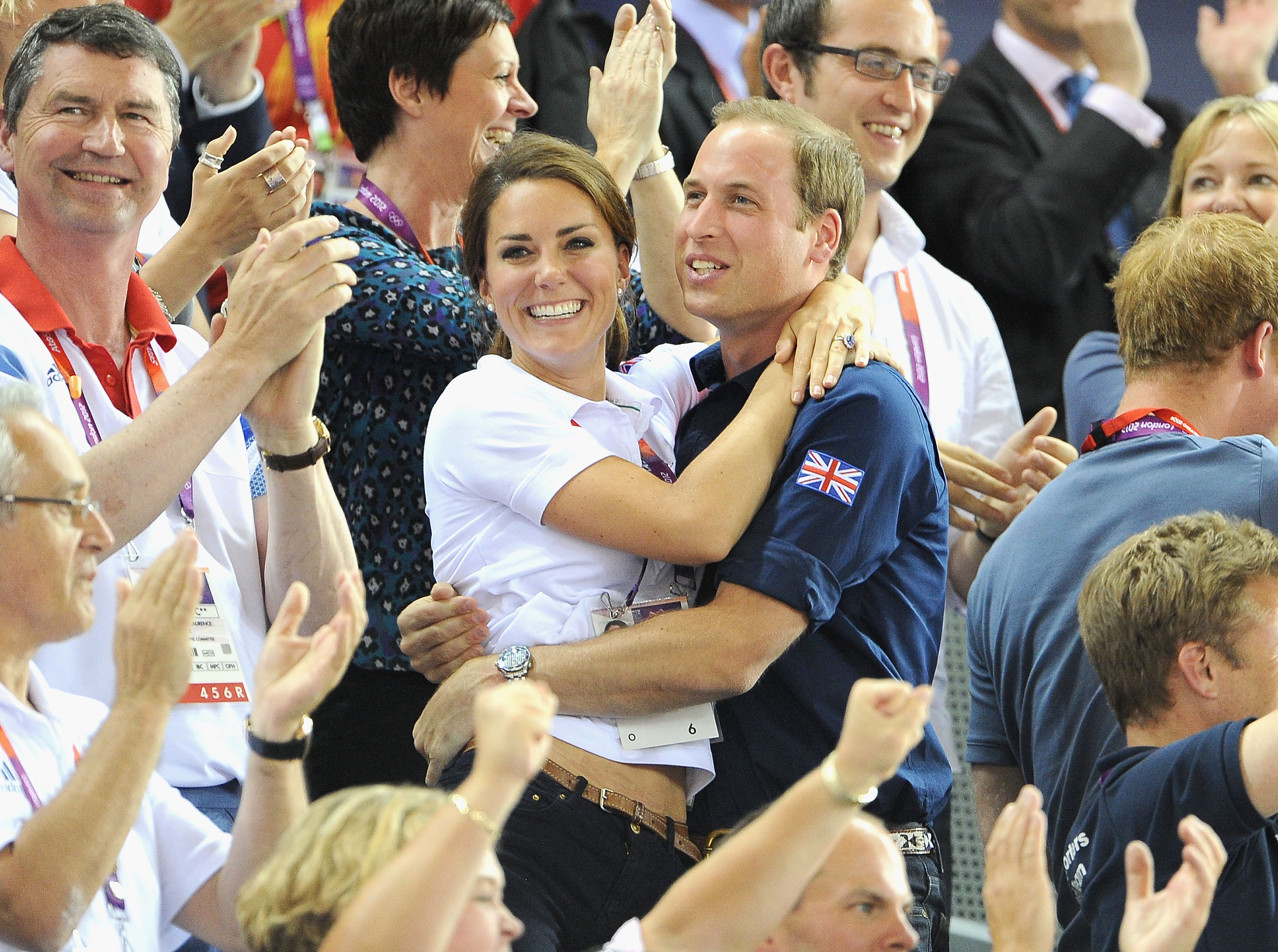 Kate Middleton and Prince William celebrate after Great Britain's performance in the cycling event.