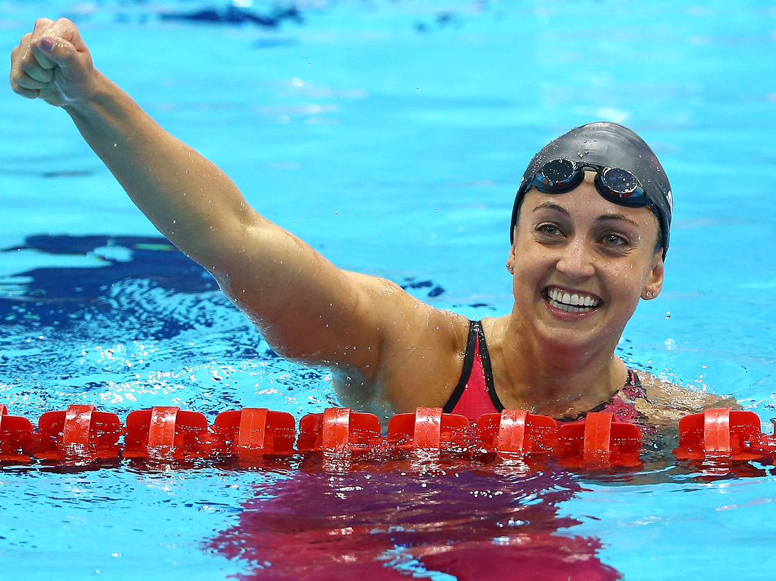 Rebecca Soni of the United States celebrates after setting a new world record time of 2:19.59 in the women's 200m breaststroke and winning a gold medal Thursday.