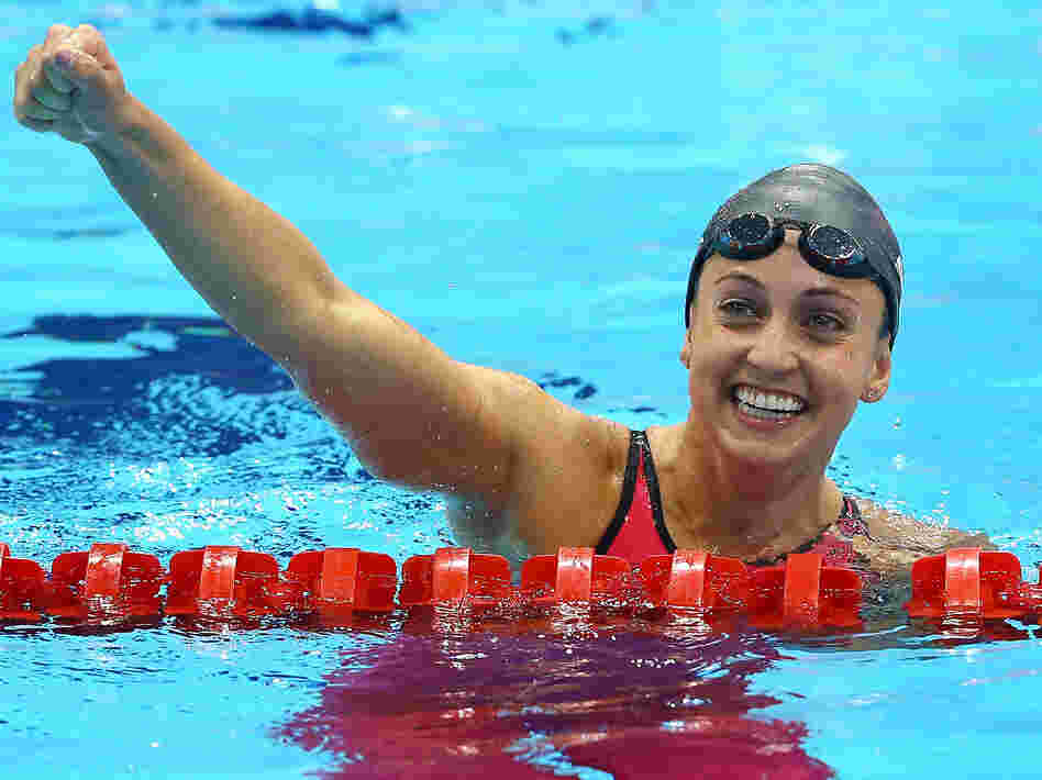 Rebecca Soni of the United States celebrates after setting a new world record time of 2:19.59 in the women's 200m breaststroke and winning a gold medal Thursday.