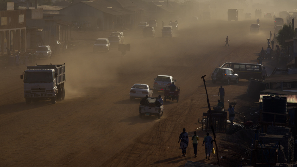 Traffic moves along a major road under construction in Juba, South Sudan's capital, on July 19, shortly after the country celebrated its first anniversary of independence from Sudan. Corruption scandals have plagued the impoverished new nation over the past year.