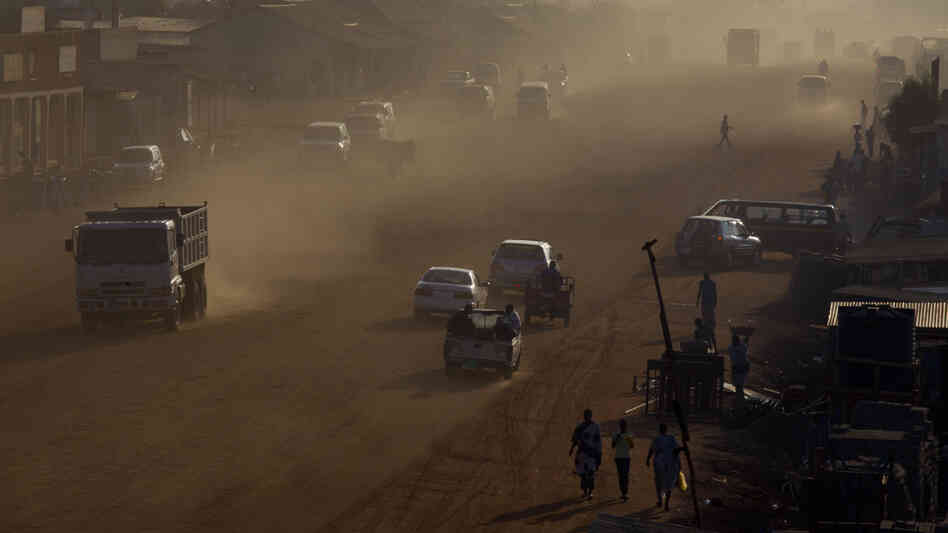 Traffic moves along a major road under construction in Juba, South Sudan's capital, on July 19, shortly after the country celebrated its first anniversary of independence from Sudan. Corruption scandals have plagued the impoverished new nation over the past year.