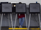 A voter casts his ballot in a West Miami, Fla., fire station during the Republican primary in January. A voter casts his ballot in a West Miami, Fla., fire station during the Republican primary in January.