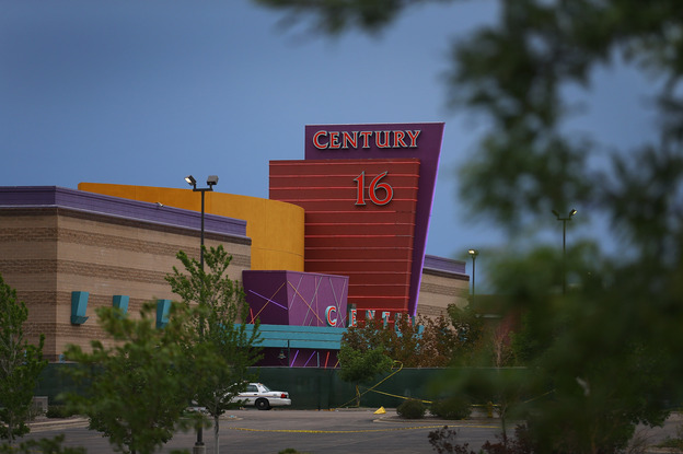 The Century 16 movie theatre is seen from a memorial setup across the street in Aurora, Colorado.