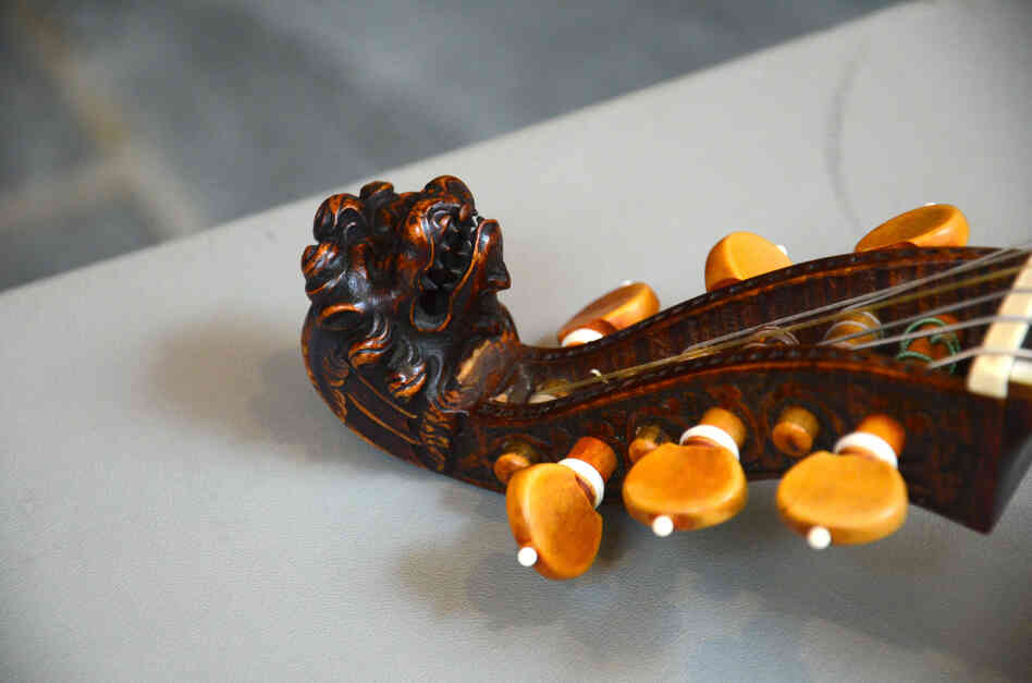 A carved lion head on an original, 18th-century bass viola da gamba made in Sweden, patterned after an English viol.