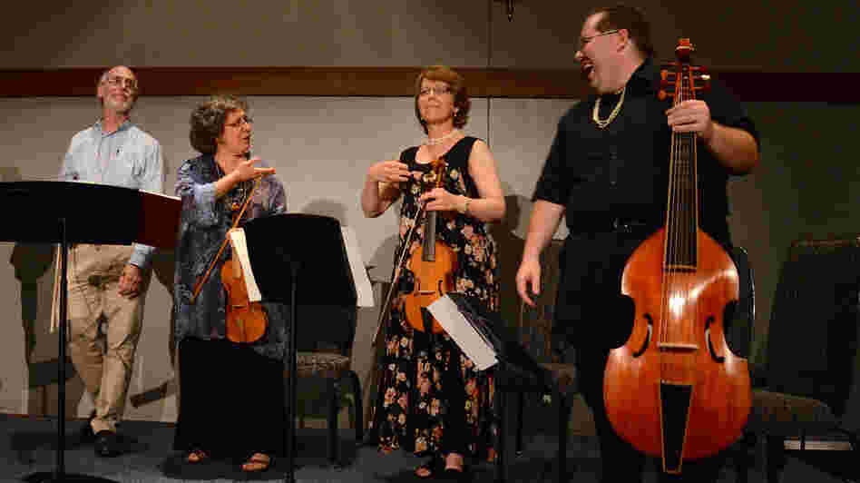 Jack Ashworth, Tina Chancey, Lisa Terry and Phillip Serna perform Sunday during the closing banquet of the weeklong conclave at the University of Delaware in Newark, Del.