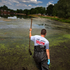 Whistle-blower John Bolenbaugh wades through thick mud in the Kalamazoo River looking for leftover traces of oil from the July 2010 Enbridge oil sands pipeline spill. Whistle-blower John Bolenbaugh wades through thick mud in the Kalamazoo River looking for leftover traces of oil from the July 2010 Enbridge oil sands pipeline spill.