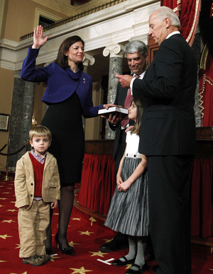 Vice President Joe Biden conducts a ceremonial swearing in for Ayotte as U.S. senator on Jan. 5, 2011, in the Capitol. With Ayotte are her husband and children. Vice President Joe Biden conducts a ceremonial swearing in for Ayotte as U.S. senator on Jan. 5, 2011, in the Capitol. With Ayotte are her husband and children.